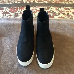 Steve Madden high wedge sneakers.